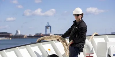 A man standing on one of Cerato Terminal LLCs ships in Rotterdam, Denmark